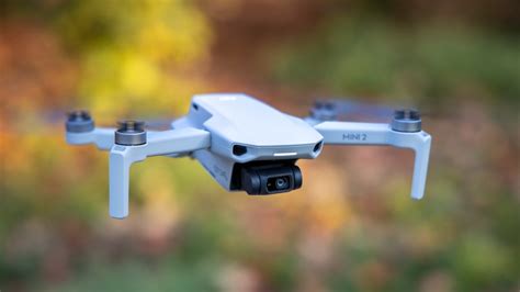 Small size drone with foldable arm altitude hold mode function: The DJI Mini 2 Shoots 4K Video and RAW Photos