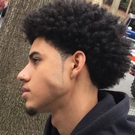 Cutting off your damaged hair to grow natural and healthy hair doesn't have to be traumatic, if you choose one of these totally trendy short afro hairstyles. Curling Afro Haircut - 35 Awesome Afro Hairstyles For Men ...