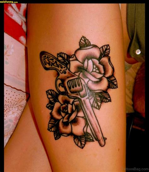 See more ideas about tattoos, rose tattoos, body art tattoos. 72 Brilliant Gun Tattoos Design On Thigh