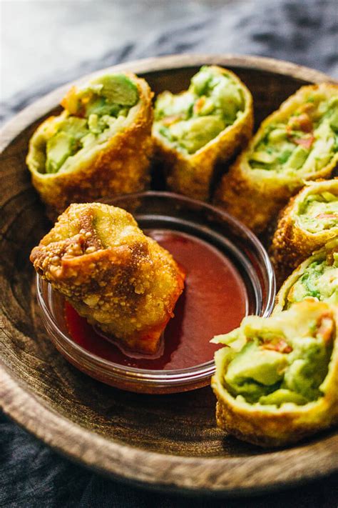 My daughter described them as tiny crispy burritos. Avocado Egg Rolls With Sweet Chili Sauce - Savory Tooth