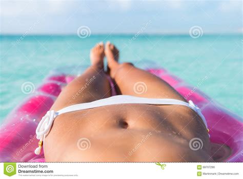 Achieve your beach body with help from whey protein. Bikini Body Of Beach Woman Relaxing On Water Stock Photo ...