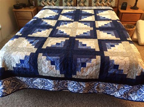 Maybe you would like to learn more about one of these? Black, white and blue log cabin | Log cabin quilts, Log ...