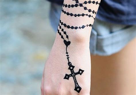 9 rosary tattoo on hand. 47 Attractive Band Tattoos For Your Writs