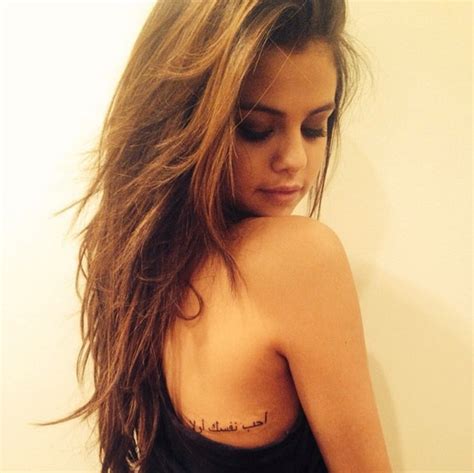 Celebrities, tattooed musicians, tattooed female celebrities, tattooed american celebrities, selena gomez's tattoos, tattooed american female celebrities, one word, english words, sunshine, languages, english. Selena Gomez Celebrates Upcoming Birthday With New Arabic ...