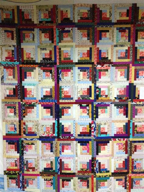 Historically, i believe some log cabin quilts were tied due to the amount of fabric and seams. Scrap log cabin. | Log cabin quilts, Quilt piecing, Quilts