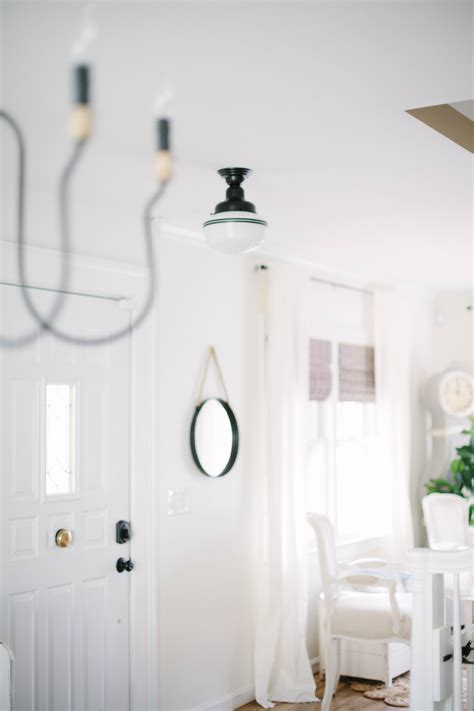 Until now, there has been confusion on how to measure a wall space when door side windows or sidelights are present. Home // How to Define Your Foyer Space - Lauren McBride