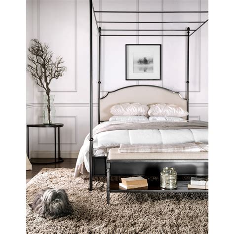 A canopy bed is a bed with a canopy, which is usually hung with bed curtains. Our Best Bedroom Furniture Deals | Metal canopy bed ...