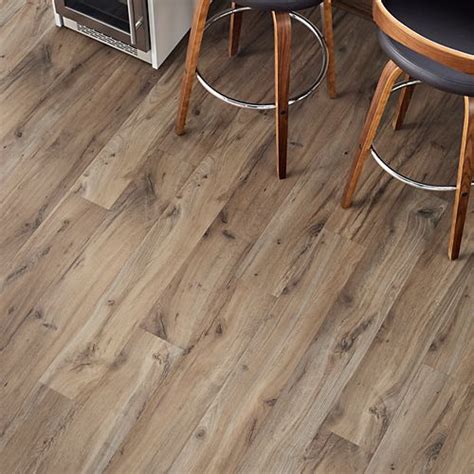 The rustic style is enhanced by subtle character marks of knots, cracks and pergo outlast+ is a waterproof laminate flooring with an authentic look and feel. Pergo Outlast+ with SpillProtect Linton Auburn Oak ...
