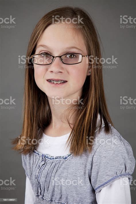 American fashion model and television personality; Beautiful Smiling 12year Old Girl On Grey Background Stock ...
