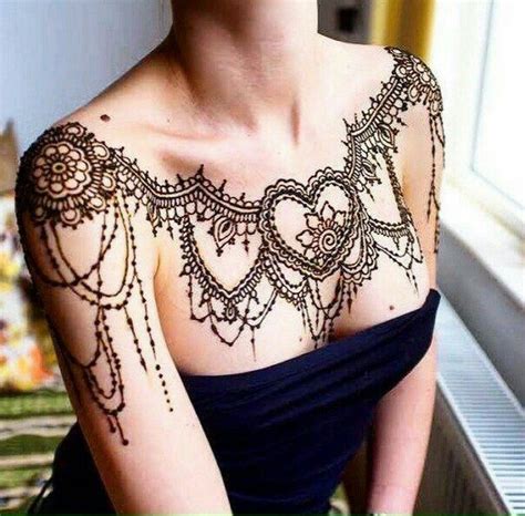 The most common temporary tattoo men chest. 40 Awesome Women's Chest Tattoo | Henna tattoo designs ...