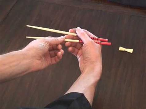 And, as the text points out, this is the correct way to use chopsticks! How To Hold Chopsticks - YouTube