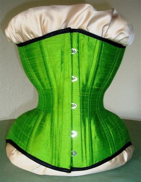 Visit our website www.valkyriecorsets.com to see more of our designs or follow us on instagram to see our bespoke work. Corsets-more-Doris-muller-pipestem-green - Lucy's Corsetry