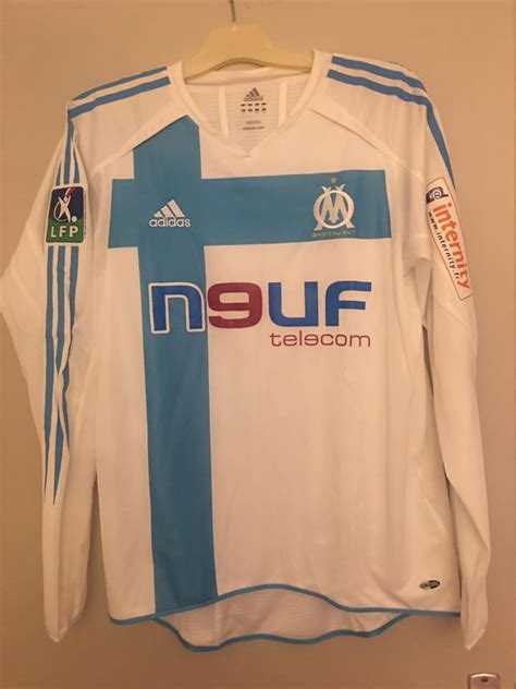 Old boys grande interior rosario athlete sports indoor interiors. Olympique Marseille Home football shirt 2004 - 2005. Sponsored by n9uf Telecom