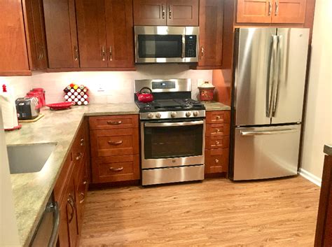 Hickory shaker cabinets 10 x 10 kitchen layout $ 1,999.00; Weiler's Kitchens & Bath Design Center Philadelphia, Bucks & Montgomery County, PA