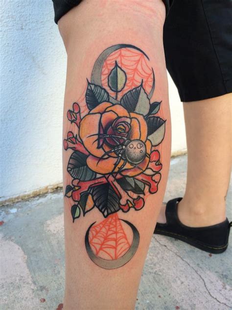 The colour combination used has clearly highlighted every feature of the spider tattoo making it look quite alive and spectacular the place the tattoo is worn makes the tattoo visually appealing too. Traditional color rose with spider and bones tattoo. Mike ...