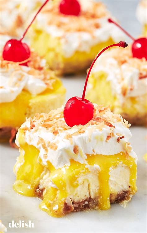 Quite fast and easy to put together, these homemade desserts are perfect to feed a crowd. Piña Colada Cheesecake Bars | Recipe | Summer dessert ...