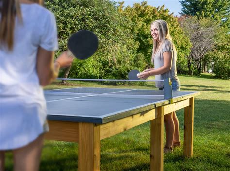Making a concrete ping pong table. Take your backyard fun to a new level with this cool outdoor ping-pong table. With a cedar base ...