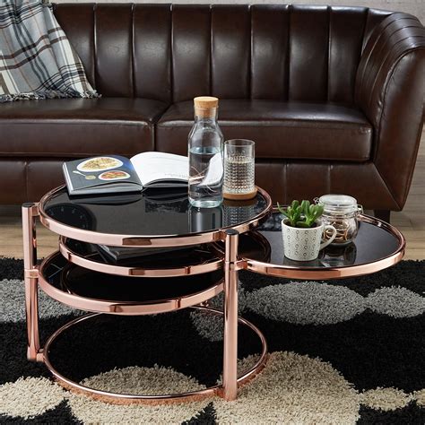 A coffee table, also called a cocktail table, is a style of long, low table which is designed to be placed in front of a sofa, to support beverages (hence the. Furniture of America Cara Contemporary Round Motion Glass ...