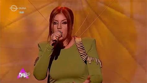 She first came to prominence in 2010 after winning the fifth season of the hungarian show megasztár. Wiwi Jury: Hungary's Reni Tolvai with "Fire"