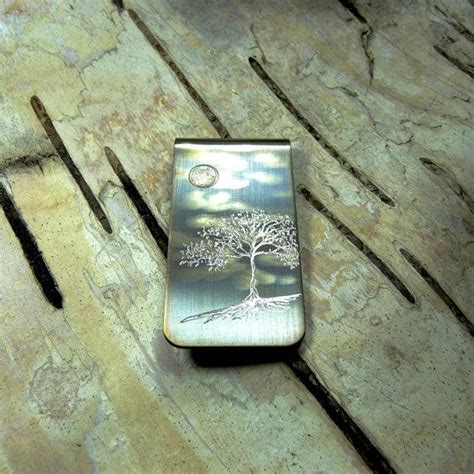 Explore the top 10 best money clips for men that mix convenience and class. TREE of LIFE Super Cool Money Clip by The Rave N by theraveniron, $40.00 | Cool money clips ...