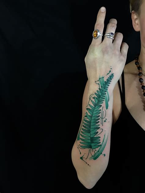 Professional tattoo artists and body piercing artist. Watercolor fern leaf tattoo by Tim Mueller in Los Angeles ...