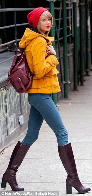 Taylor swift in blue dress. Taylor Swift shows off pins in skinny jeans as she returns ...