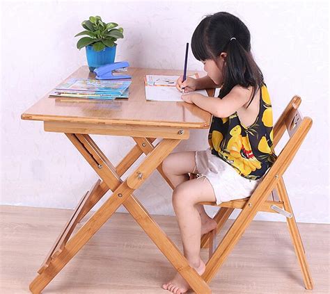 Children are sure to love hanging out in their cool new spot, customized just for them. 80*50*(57 76)CM Children Study Table Folding Bamboo ...