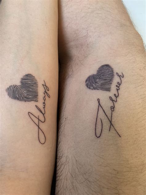 There is using a positive and a negative meaning behind the design. #Couple tattoo # fingerprint heart tattoo | Fingerprint ...