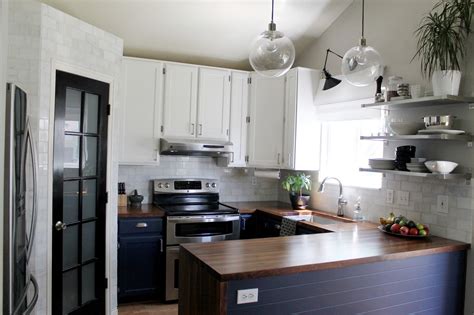 Things that i love about chris and julia's choices are definitely the choice to recess the wall around the cabinets, the changes and additions in windows (fabulous light, totally jealous), and the wood countertop on the island. The Kitchen: Before and Afters! - Chris Loves Julia