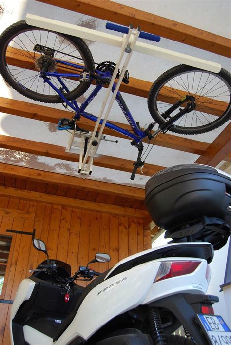 With any ceiling bike rack, installation will always be slightly more tricky than the other bike storage ideas (simply because the the more basic (and cheaper) zero gravity bike rack amazon attaches to the wall, while the more rugged (and expensive) flat bike lift amazon attaches to the ceiling. Ceiling Bike Lift for Garages, Hallways, Basements | flat ...