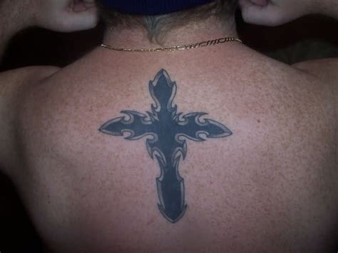 The meanings associated with cross tattoos. Pin on Solid Cross Tattoo