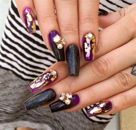 Unique 99s low heat mode is more suitable for curing builders, hard gels. Purple and black coffin nails with gold flakes gems | Gold ...