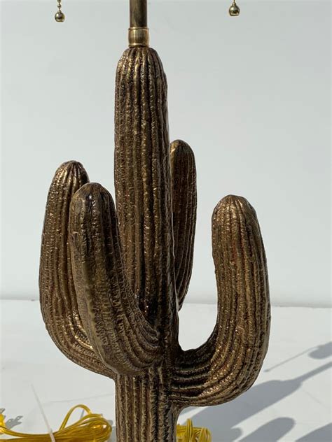 Saguaro is a cactus that looks like a tree that can grow over 40 feet. Brass Saguaro Cactus Lamps For Sale at 1stdibs