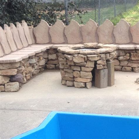 18 wheeler rim fire pit. Homemade fire pit, made from creek rock and 18 wheeler ...