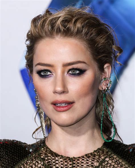 Heard first gained mainstream recognition for supporting roles in the action film never back down (2008). AMBER HEARD at Aquaman Premiere in Hollywood 12/12/2018 ...