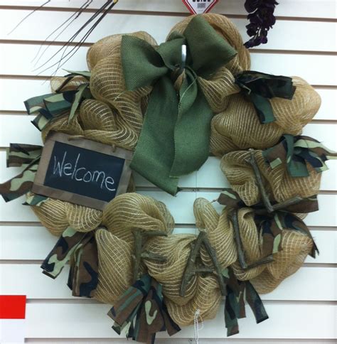 Pumpkins, pine cones and plaid ribbon. "Welcome Fall" deco mesh wreath with camo. 2014. Laura A ...