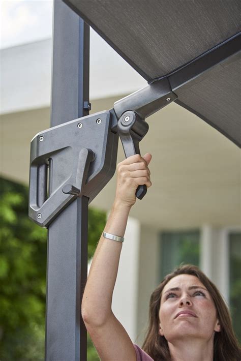 A cantilever parasol hangs over your furniture, rotates 360 degrees and has a side stand. Pin on Parasols