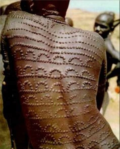 From wikimedia commons, the free media repository. 10 Amazing Scarification Tattoos - Body Art Guru