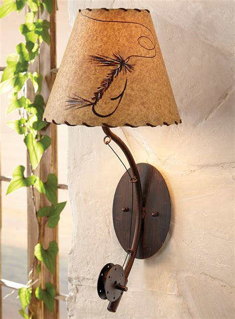 Featuring natural and synthetic materials including hooks, hackle, cdc, feathers, marabou, dubbing, beads, eyes, rubber legs , chenille, synthetic wing fibers, hair, skins, tinsel, thread, wire, wing case materials, yarn. Fly Rod Wall Lamp | Wall lamp, Lamp, Fishing decor
