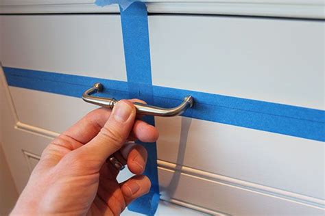 There is no counter and the crown moulding and backsplash aren't in yet. How to Install Cabinet Handles | Cabinet handles, Cabinet ...