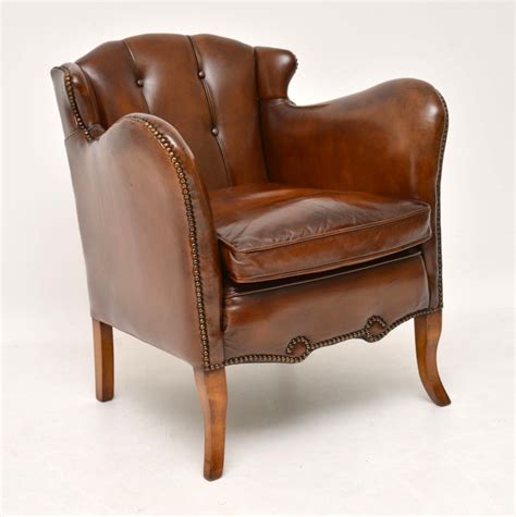 Frame is constructed of a combination of hardwood, softwood, particle board and 16mm and 18mm plywood. Pair of Stylish Antique Swedish Leather Armchairs ...