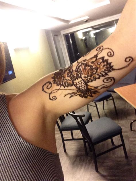 Henna tattoo designs bring about multiple thoughts. Owl henna tattoo arm design | Tattoo arm designs, Henna ...