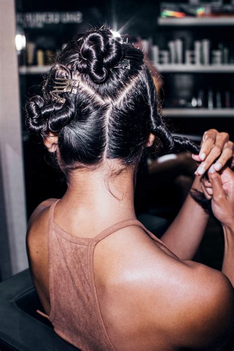 At the same time, brush your hair straight down. How to Properly Blow Dry Frizz-Free Curly Hair - Coveteur