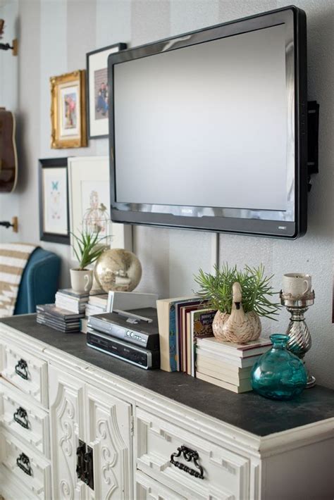 Transform your home with the help of our inspiring images and see some amazing tv wall design taking place! Ooooo yes! Gallery wall for decor, chest of drawers for ...