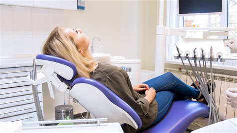 Dentists and dental students often assume awkward physical positions while providing treatment to (a) get a better view of the intraoral cavity; Pain-Free Dentistry - Wurzbach Parkway Family Dental