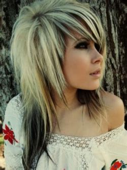 You can see red streaks or highlights in the hair. 2010 Blonde Emo Hair Styles