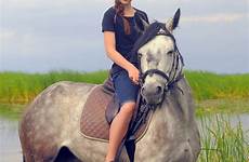 horse teen riding girl stock