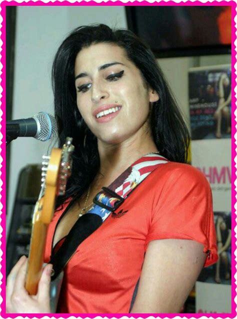 Singer amy winehouse has a drink between songs at the virgin festival at pimlico race course, in baltimore, maryland august 4, 2007. Amy Winehouse | Young amy winehouse, Amy winehouse, Winehouse