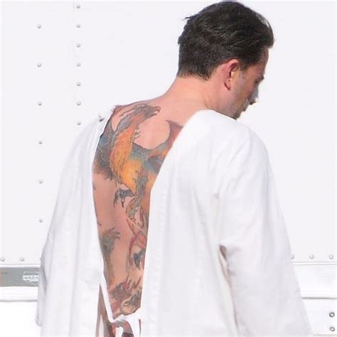 Affleck was recently photographed on the beach with the tattoo in full view—even though two years ago he called it fake for a movie. back in 2015, affleck was first spotted with the tattoo on the set of his movie live by night. Ben Affleck's Back Tattoo Pictures | POPSUGAR Celebrity