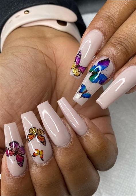 Before applying the color you've chosen, start with a base coat. 32 Beautiful Butterfly Nails Designs You Want to Have Right Away - Lily Fashion Style